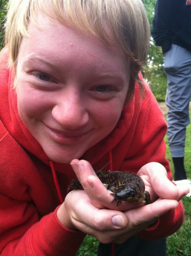 Katherine holds her first tiger salamander! Obvious soulmates.