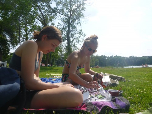 Gina and Ali painting with water colors beside Elk Lake